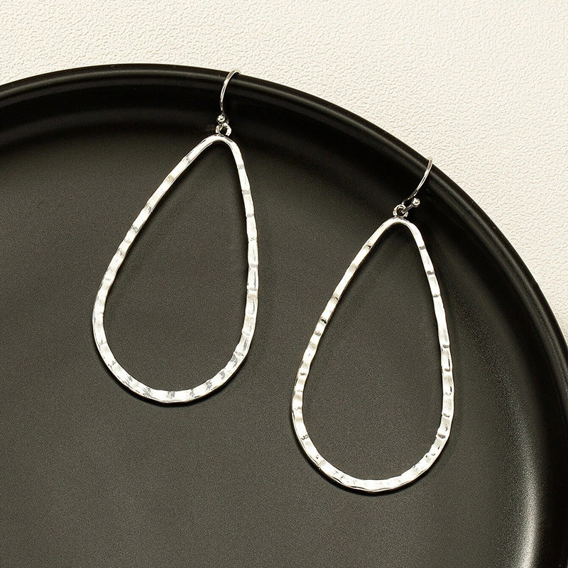 Metal Water Drop Hollow Stud Earrings Simple Pattern photo 6