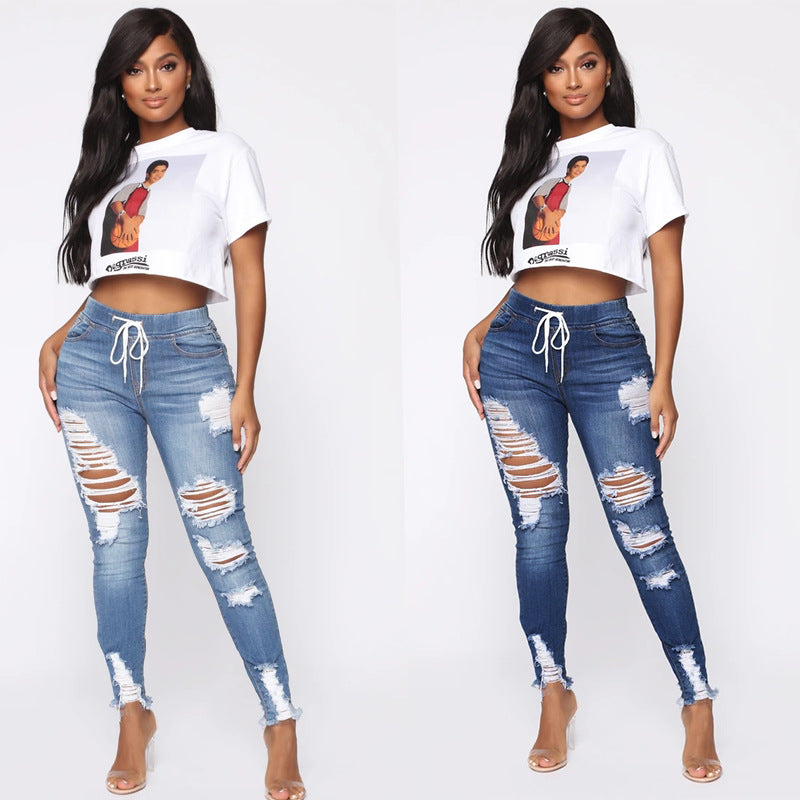 Ripped High-rise Jeans photo 1