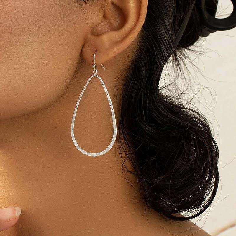 Metal Water Drop Hollow Stud Earrings Simple Pattern photo 1