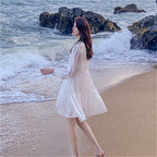 Pleated V-neck Dress photo 1
