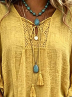 Full Size Tassel Tie Neck Ruffled Hem Blouse Plus (10)
