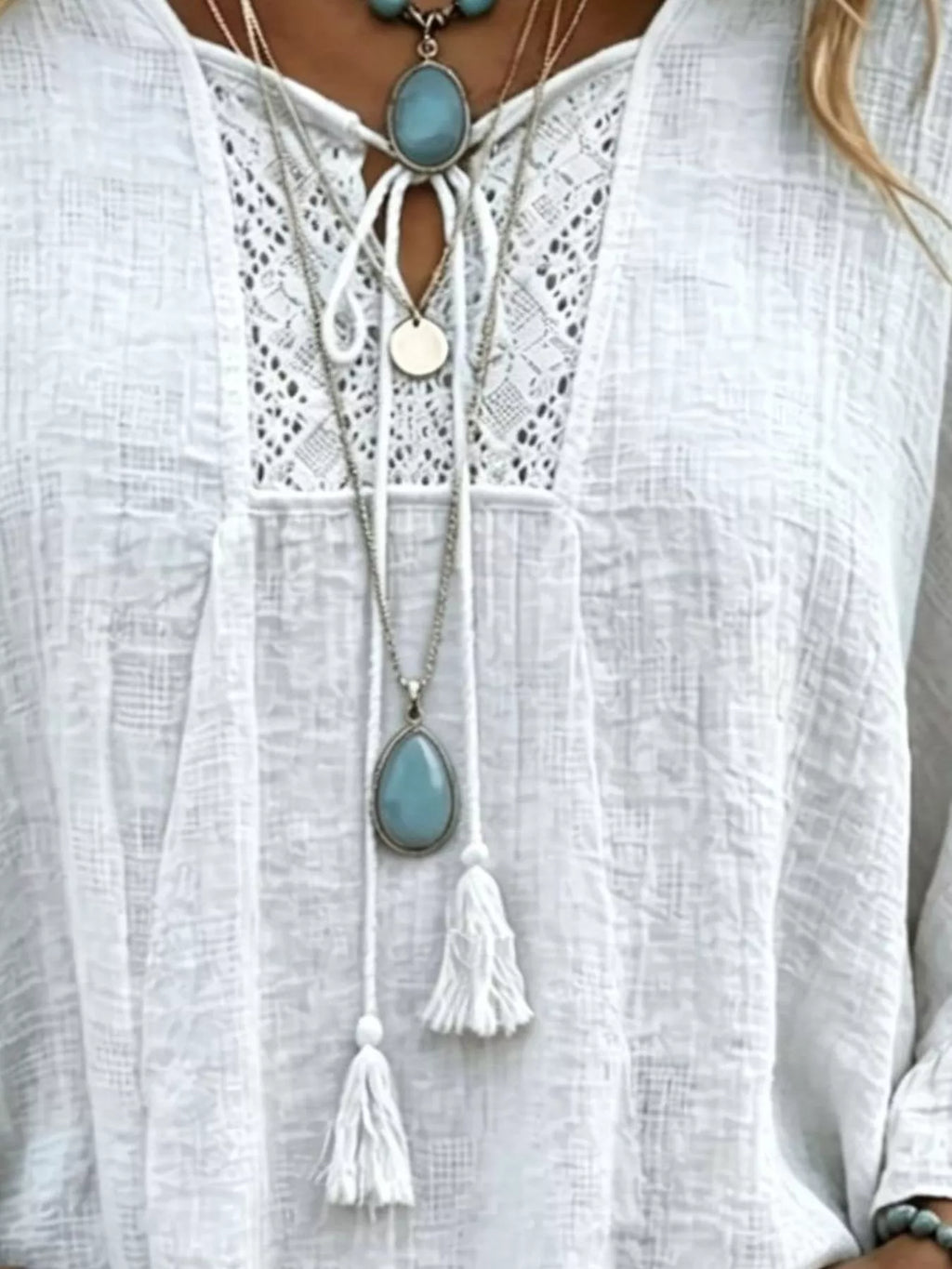 Full Size Tassel Tie Neck Ruffled Hem Blouse Plus (2)