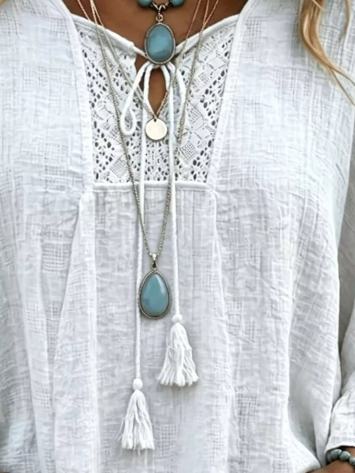 Full Size Tassel Tie Neck Ruffled Hem Blouse Plus (2)