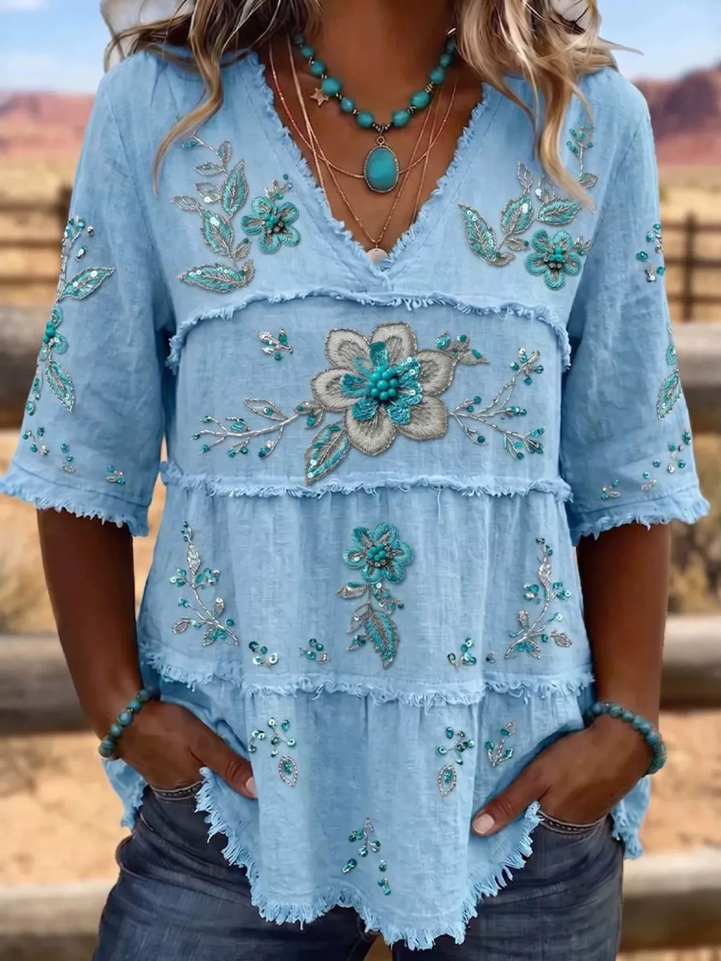 Full Size Floral Raw Hem V-neck Blouse Plus
