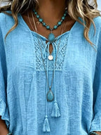 Full Size Tassel Tie Neck Ruffled Hem Blouse Plus (8)