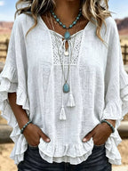 Full Size Tassel Tie Neck Ruffled Hem Blouse Plus