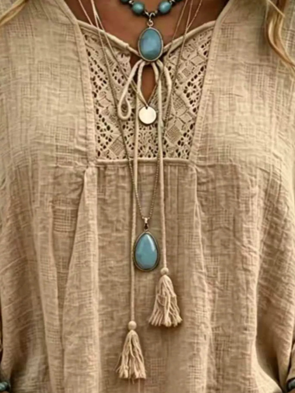 Full Size Tassel Tie Neck Ruffled Hem Blouse Plus (6)