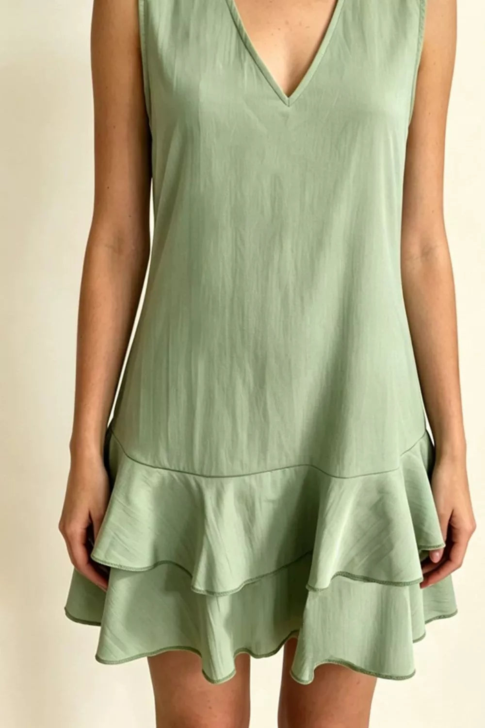 Full Size Sleeveless V-neck Ruffle Hem Mini Dress Plus (6)