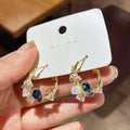Gold-Tone Green Flower Earrings