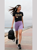 Mama Needs Coffee Short Sleeve T-shirt worn by a model