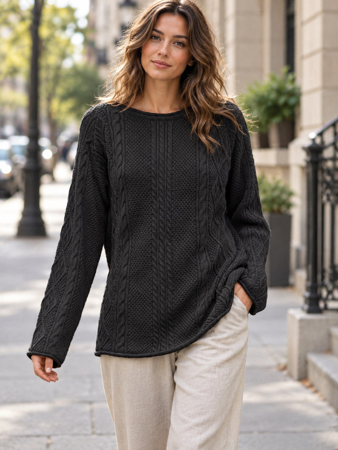 Crew Neck Cable-knit Sweater styled on a model
