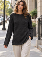 Crew Neck Cable-knit Sweater styled on a model