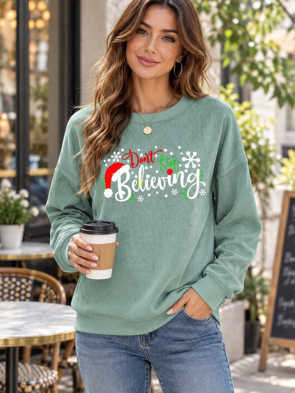 Don't Stop Graphic Sweatshirt styled on a model