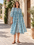 Floral Tie Neck Lantern Sleeve Dress styled on a model