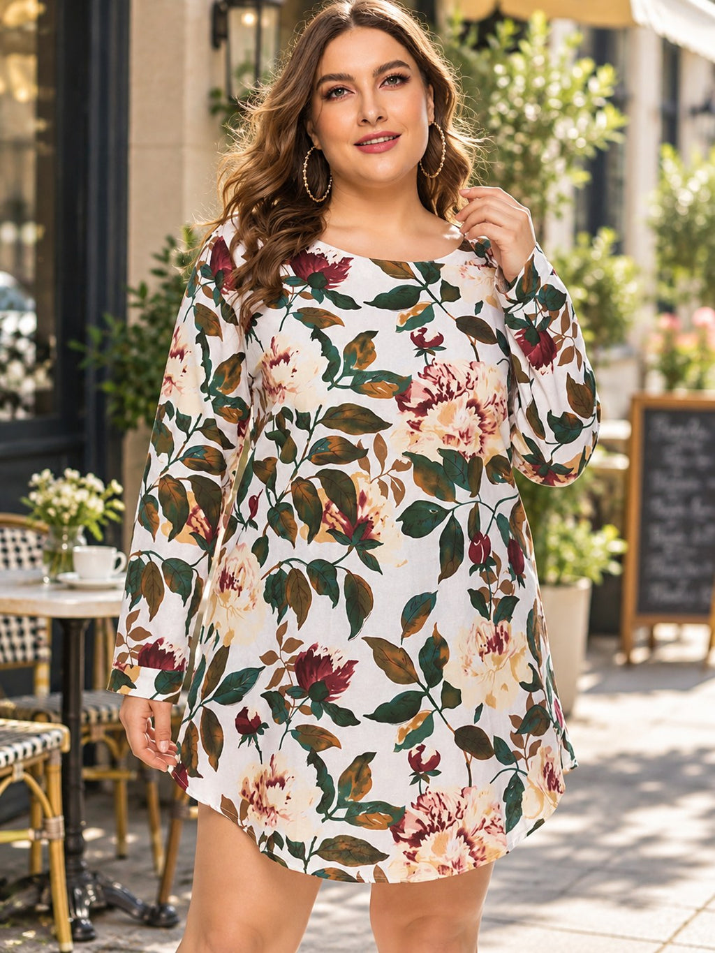 Full Size Floral Long Sleeve Mini Dress styled on a model