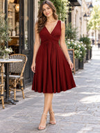 Full Size Twisted Sleeveless Ruched Waist A-line Dress Plus styled on a model