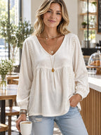 Full Size V-neck Long Sleeve Velvet Blouse Lace Trim Plus styled on a model