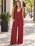 Full Size V-neck Wide Strap Jumpsuit styled on a model