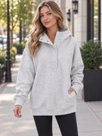 Half Snap Dropped Shoulder Hoodie styled on a model
