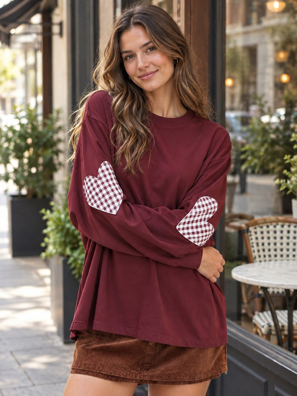 Heart Patch Long Sleeve Sweatshirt styled on a model