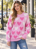 Heart Pattern Beaded Round Neck Sweater styled on a model