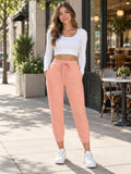 High-Waist Cropped Drawstring Pants styled on a model