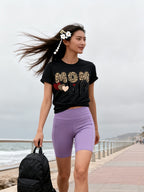 Mama Needs Coffee Short Sleeve T-shirt worn by a model
