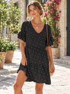 Polka Dot V-neck Short Sleeve Mini Dress styled on a model