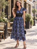 Printed V-neck Ruffle Sleeve Midi Dress styled on a model