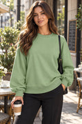 Round Neck Long Sleeve Sweatshirt styled on a model