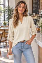V-neck Roll-tap Sleeve Blouse styled on a model